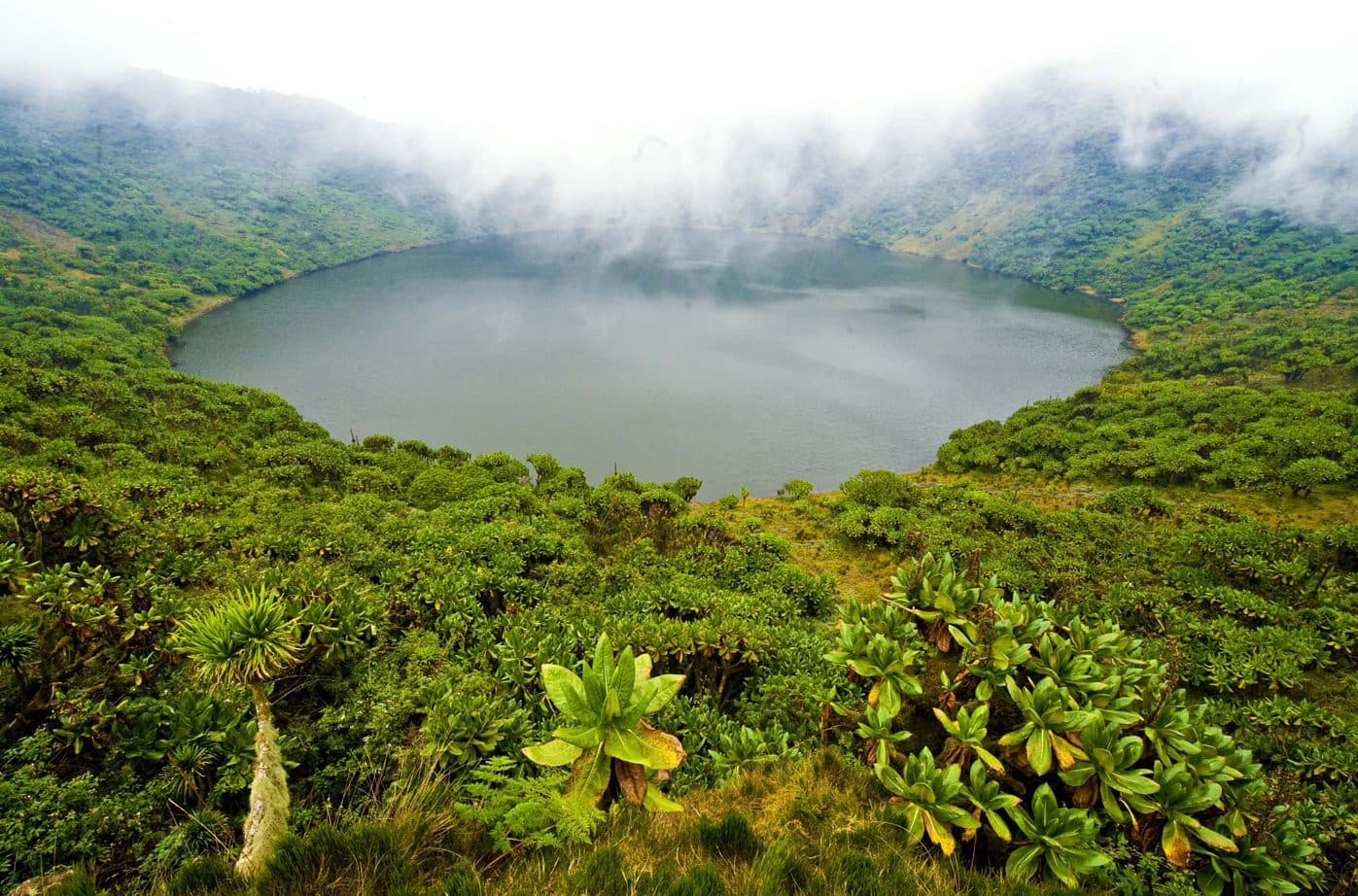 The crater lake on top of Mount Bisoke